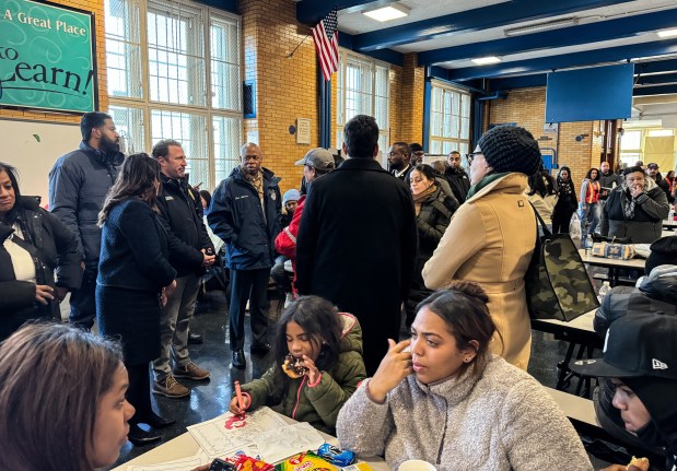 Mayor Eric Adams visits displaced residents at P.S. 76 after a five-alarm fire in the Bronx is pictured on Friday, January 10, 2025. (Michael Appleton / Mayoral Photography Office)