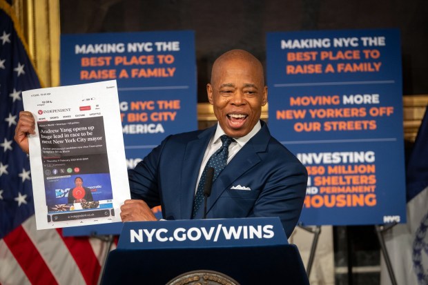 Mayor Eric Adams compared Cuomo's possible lead to the early edge held by Andrew Yang in 2021, calling it "deja vu" and pulling out a print-out of a 2021 headline that read "Andrew Yang opens up huge lead in race to be next New York City mayor" to illustrate his point Monday at City Hall. (Ed Reed / Mayor's Office)