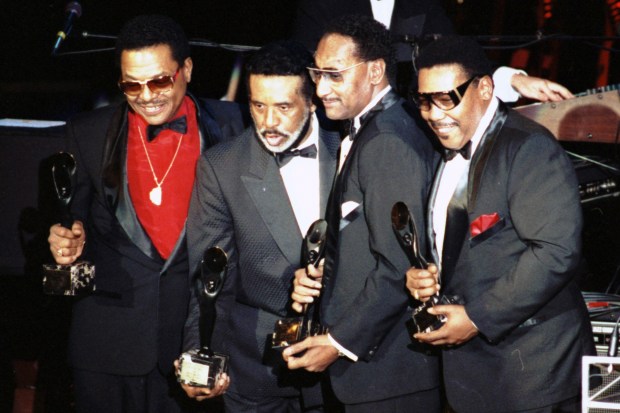 FILE- The Four Tops, from left, Renaldo "Obie" Benson; Levi Stubbs; Abdul "Duke" Fakir, and Lawrence Payton appear in New York after they were inducted into the Rock and Roll Hall of Fame. (AP Photo/Ron Frehm, File)