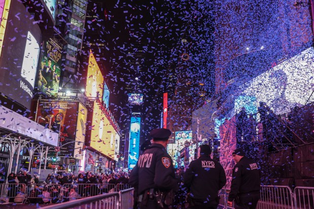 The NYPD stands by during the annual New Year's Eve celebration in Times Square, Tuesday, Dec. 31, 2024, in New York. (AP Photo/Heather Khalifa)