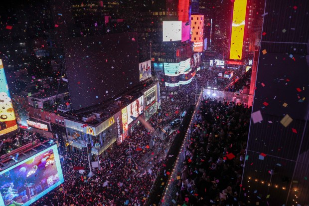 A view of Times Square as confetti falls during the annual New Year's Eve celebration, Wednesday, Jan. 1, 2025, in New York. (AP Photo/Heather Khalifa)