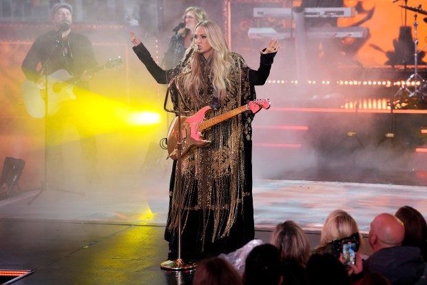 Carrie Underwood performs during the Times Square New Year's Eve celebration on Tuesday, Dec. 31, 2024, in New York. (Photo by Charles Sykes/Invision/AP)