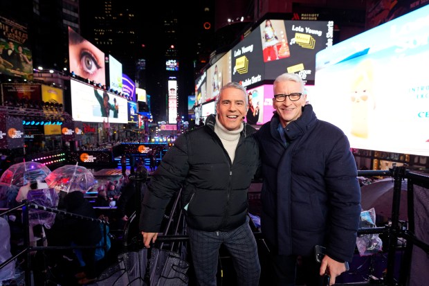 Andy Cohen, left, and Anderson Cooper host CNN's "New Year's Eve Live" during the Times Square New Year's Eve celebration on Tuesday, Dec. 31, 2024, in New York. (Photo by Charles Sykes/Invision/AP)