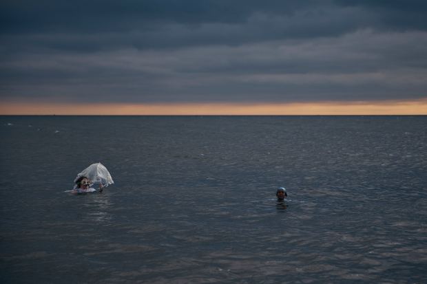 Revelers swim in cold water during the annual Polar Bear Plunge on New Year's Day, Wednesday, Jan. 1, 2025, in New York. (AP Photo/Andres Kudacki)