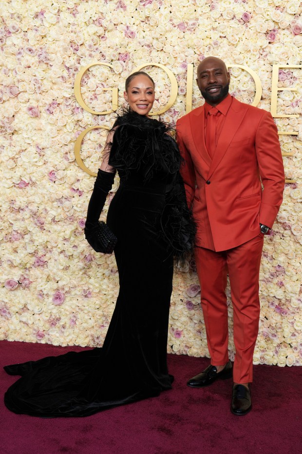 Pam Byse, left, and Morris Chestnut arrive at the 82nd Golden Globes on Sunday, Jan. 5, 2025, at the Beverly Hilton in Beverly Hills, Calif.