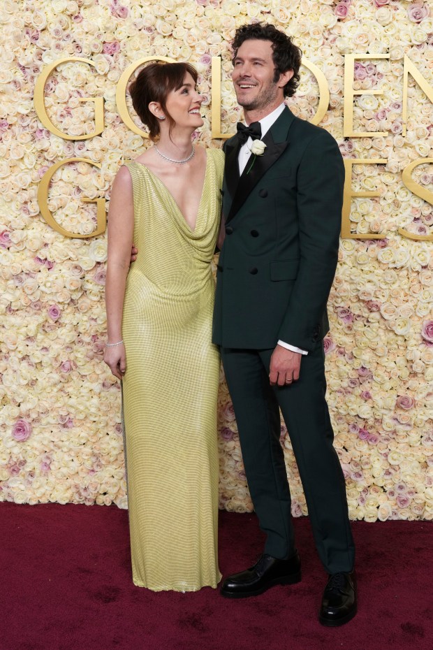 Leighton Meester, left, and Adam Brody arrive at the 82nd Golden Globes on Sunday, Jan. 5, 2025, at the Beverly Hilton in Beverly Hills, Calif.