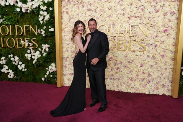 Jackie Sandler, left, and Adam Sandler arrive at the 82nd Golden Globes on Sunday, Jan. 5, 2025, at the Beverly Hilton in Beverly Hills, Calif.