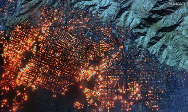 This satellite image provided by Maxar Technologies shows the Eaton Fire on Wednesday, Jan. 8, 2025, in Altadena, Calif. (Maxar Technologies via AP)