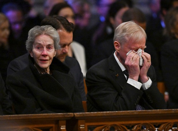 Jack Carter, right, and his wife Liz react during the state funeral of former President Jimmy Carter at the National Cathedral, Thursday, Jan. 9, 2025, in Washington. (Ricky Carioti/The Washington Post via AP, Pool)