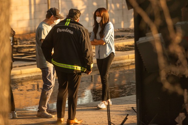 Meghan Markle, Duchess of Sussex, right, speaks with Pasadena Mayor Victor Gordo, center, and Doug Goodwin, who's home was destroyed by the Eaton Fire, in Altadena, Calif., Friday, Jan. 10, 2025.