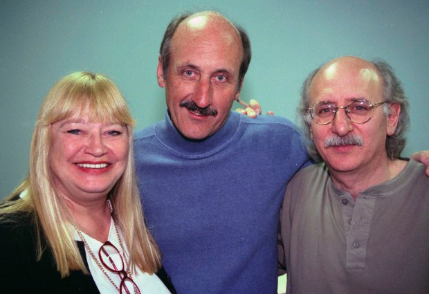 Peter Yarrow, Paul Stookey and Mary Travers, better known as Peter, Paul and Mary, right to left, are photographed at LaGuardia International High School, April 4, 1995, where they performed some of their classic songs for the students. (AP Photo/Janet Durans)