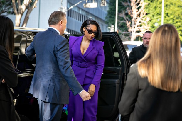 LOS ANGELES, CA - DECEMBER 13: Megan Thee Stallion whose legal name is Megan Pete arrives at court to testify in the trial of Rapper Tory Lanez for allegedly shooting her on Tuesday, Dec. 13, 2022 in Los Angeles, CA. (Jason Armond / Los Angeles Times via Getty Images)