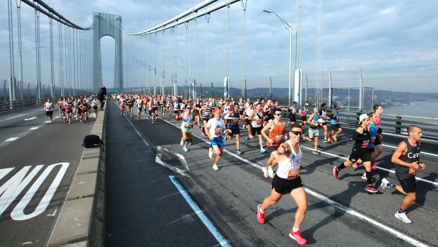 Runners cross the Verrazano Bridge before competing in the Men's division during the 52nd Edition of the New York City Marathon on November 5, 2023. (Photo by Kena Betancur / AFP) (Photo by KENA BETANCUR/AFP via Getty Images)