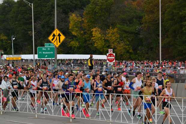 Runners take part in the 52nd Edition of the New York City Marathon on November 5, 2023. (Photo by ANGELA WEISS / AFP) (Photo by ANGELA WEISS/AFP via Getty Images)