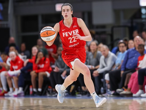 Caitlin Clark of the Indiana Fever brings the ball up court during the game against the Chicago Sky at Wintrust Arena on August 30, 2024 in Chicago, Illinois. (Photo by Michael Hickey/Getty Images)