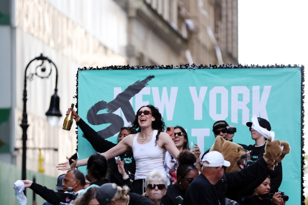 NEW YORK, NEW YORK - OCTOBER 24: Breanna Stewart #30 of the New York Liberty celebrates with the crowd during the New York Liberty Ticker Tape Victory Parade & Rally on October 24, 2024 in New York City. (Photo by Sarah Stier/Getty Images)