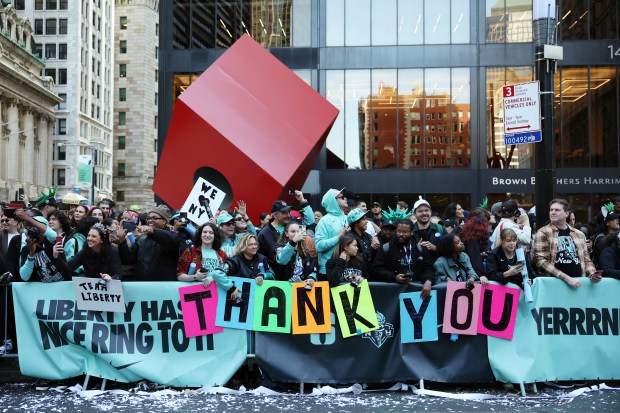 NEW YORK, NEW YORK - OCTOBER 24: Fans cheer during the New York Liberty Ticker Tape Victory Parade & Rally on October 24, 2024 in New York City. (Photo by Sarah Stier/Getty Images)