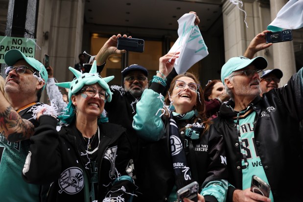 NEW YORK, NEW YORK - OCTOBER 24: Fans cheer during the New York Liberty Ticker Tape Victory Parade & Rally on October 24, 2024 in New York City. (Photo by Sarah Stier/Getty Images)