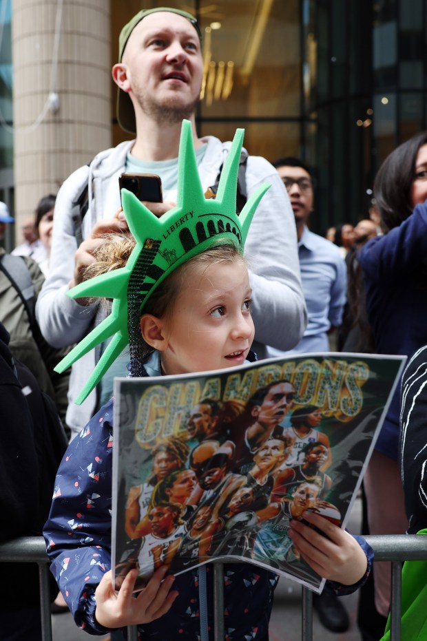 NEW YORK, NEW YORK - OCTOBER 24: Fans cheer during the New York Liberty Ticker Tape Victory Parade & Rally on October 24, 2024 in New York City. (Photo by Sarah Stier/Getty Images)