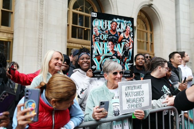NEW YORK, NEW YORK - OCTOBER 24: Fans cheer during the New York Liberty Ticker Tape Victory Parade & Rally on October 24, 2024 in New York City. (Photo by Sarah Stier/Getty Images)