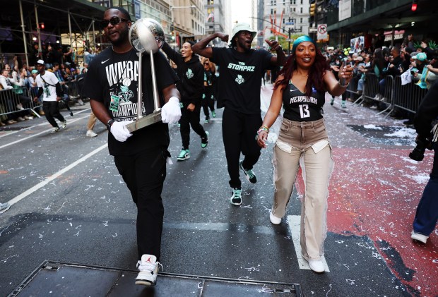 NEW YORK, NEW YORK - OCTOBER 24: The 2024 WNBA Championship Trophy is carried on the parade route during the New York Liberty Ticker Tape Victory Parade & Rally on October 24, 2024 in New York City. (Photo by Sarah Stier/Getty Images)
