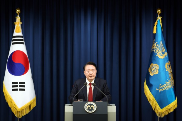 In this handout image provided by South Korean Presidential Office, South Korean President Yoon Suk-Yeol speaks during the declaration of emergency martial law at the Presidential Office on December 03, 2024 in Seoul, South Korea.