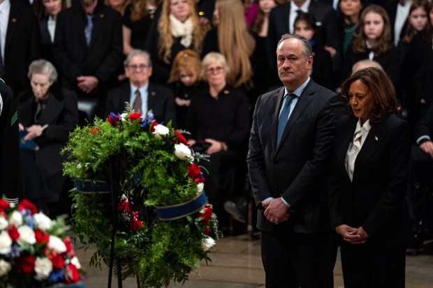 WASHINGTON, DC - JANUARY 07: Second Gentleman Doug Emhoff and U.S. Vice President Kamala Harris present a wreath during a memorial service for former U.S. President Jimmy Carter at the U.S. Capitol on January 7, 2025 in Washington, DC. Carter's body will lie in state in the Capitol Rotunda until a funeral service at the National Cathedral in Washington on January 9. Carter, the 39th President of the United States, died at the age of 100 on December 29, 2024 at his home in Plains, Georgia. (Photo by Kent Nishimura - Pool/Getty Images)