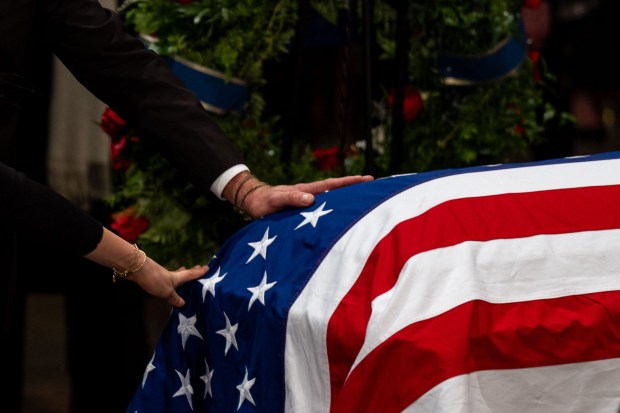 The family of former US President Jimmy Carter pay their respects during a ceremony in the Rotunda of the US Capitol, where he will lie in state, in Washington, DC, on January 7, 2025. Carter, the 39th President of the United States, died at the age of 100 on December 29, 2024 at his home in Plains, Georgia. (Photo by Kent NISHIMURA / POOL / AFP) (Photo by KENT NISHIMURA/POOL/AFP via Getty Images)