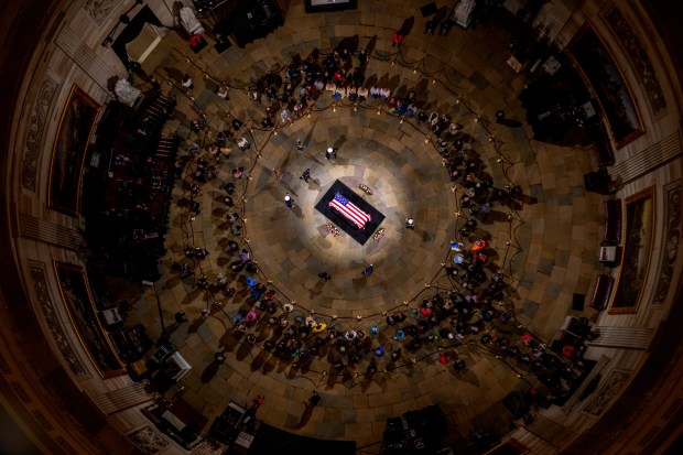 WASHINGTON, DC - JANUARY 7: Members of the public begin to be invited into the U.S. Capitol Rotunda to view the flag-draped casket of former U.S. President Jimmy Carter on January 7, 2025 in Washington, DC. Carter's body will lie in state in the Capitol Rotunda until a funeral service at the National Cathedral in Washington on January 9. Carter, the 39th President of the United States, died at the age of 100 on December 29, 2024 at his home in Plains, Georgia. (Photo by Andrew Harnik/Getty Images)