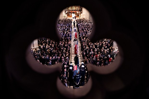 WASHINGTON, DC - JANUARY 09: The casket bearing the remains of former U.S. President Jimmy Carter arrives inside Washington National Cathedral for his state funeral on January 9, 2025 in Washington, DC. President Joe Biden declared today a national day of mourning for Carter, the 39th President of the United States, who died at the age of 100 on December 29, 2024 at his home in Plains, Georgia. Following the state funeral, Carter's remains will be returned to Plains, Georgia where he will be interred after a private family service. (Photo by Haiyun Jiang-Pool/Getty Images)