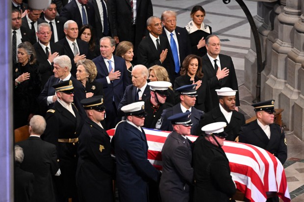 The flag-draped casket of former US President Jimmy Carter arrives for his State Funeral Service at the Washington National Cathedral in Washington, DC, on January 9, 2025. (Photo by Mandel NGAN / AFP) (Photo by MANDEL NGAN/AFP via Getty Images)