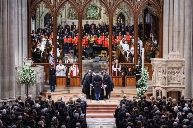 WASHINGTON, DC - JANUARY 09: The casket bearing the remains of former U.S. President Jimmy Carter arrives inside Washington National Cathedral for his state funeral on January 9, 2025 in Washington, DC. President Joe Biden declared today a national day of mourning for Carter, the 39th President of the United States, who died at the age of 100 on December 29, 2024 at his home in Plains, Georgia. Following the state funeral, Carter's remains will be returned to Plains, Georgia where he will be interred after a private family service. (Photo by Haiyun Jiang-Pool/Getty Images)