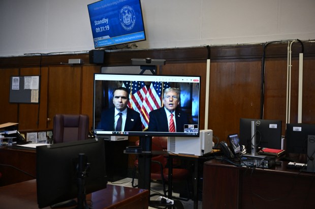 US President-elect Donald Trump appears remotely for a sentencing hearing in front of New York State Judge Juan Merchan in the criminal case in which he was convicted in 2024 on charges involving hush money paid to a porn star, at New York Criminal Court in Manhattan in New York City, on January 10, 2025. (Photo by ANGELA WEISS/POOL/AFP via Getty Images)