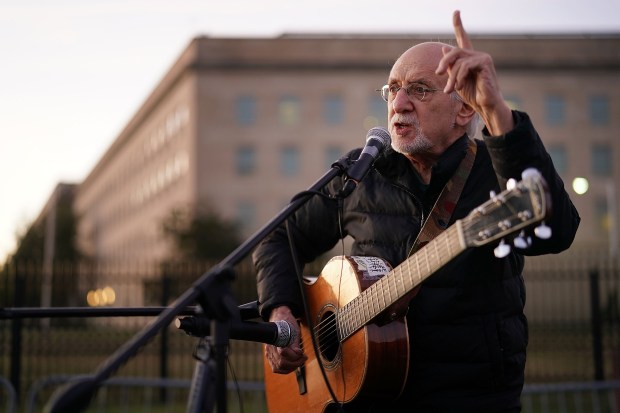 Peter Yarrow, founding member of the legendary folk group Peter, Paul and Mary, speaks about the 1967 March on the Pentagon during a vigil marking the 50th anniversary of the protest outside the Pentagon October 20, 2017 in Arlington, Virginia. (Photo by Chip Somodevilla / Getty Images)