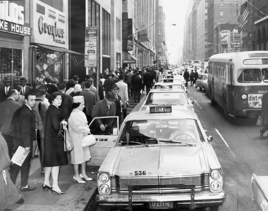 Taxis line up for rides in front of Grand Central Terminal.
