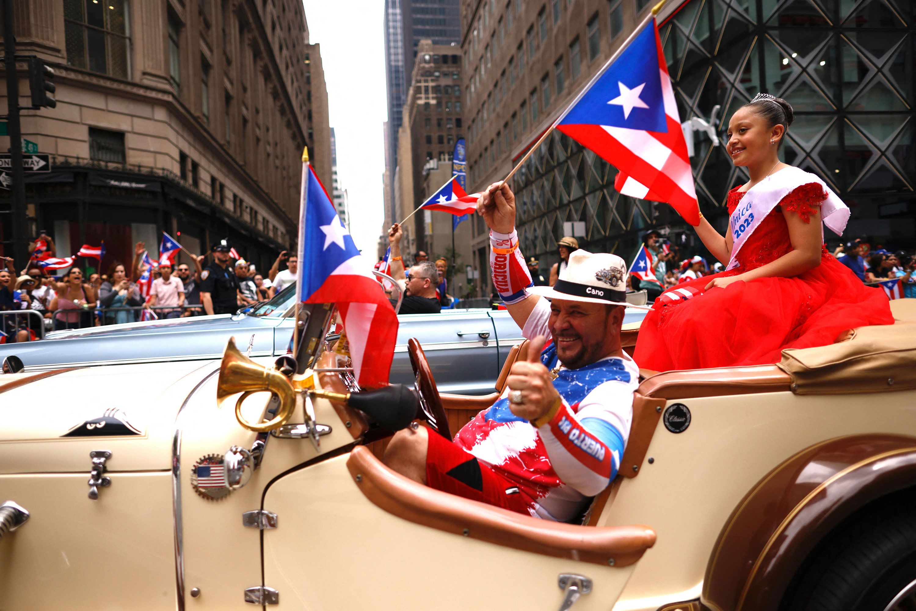 Participants pose for a photo during the 66th annual National Puerto Rican Day Parade in New York City on June 11, 2023.