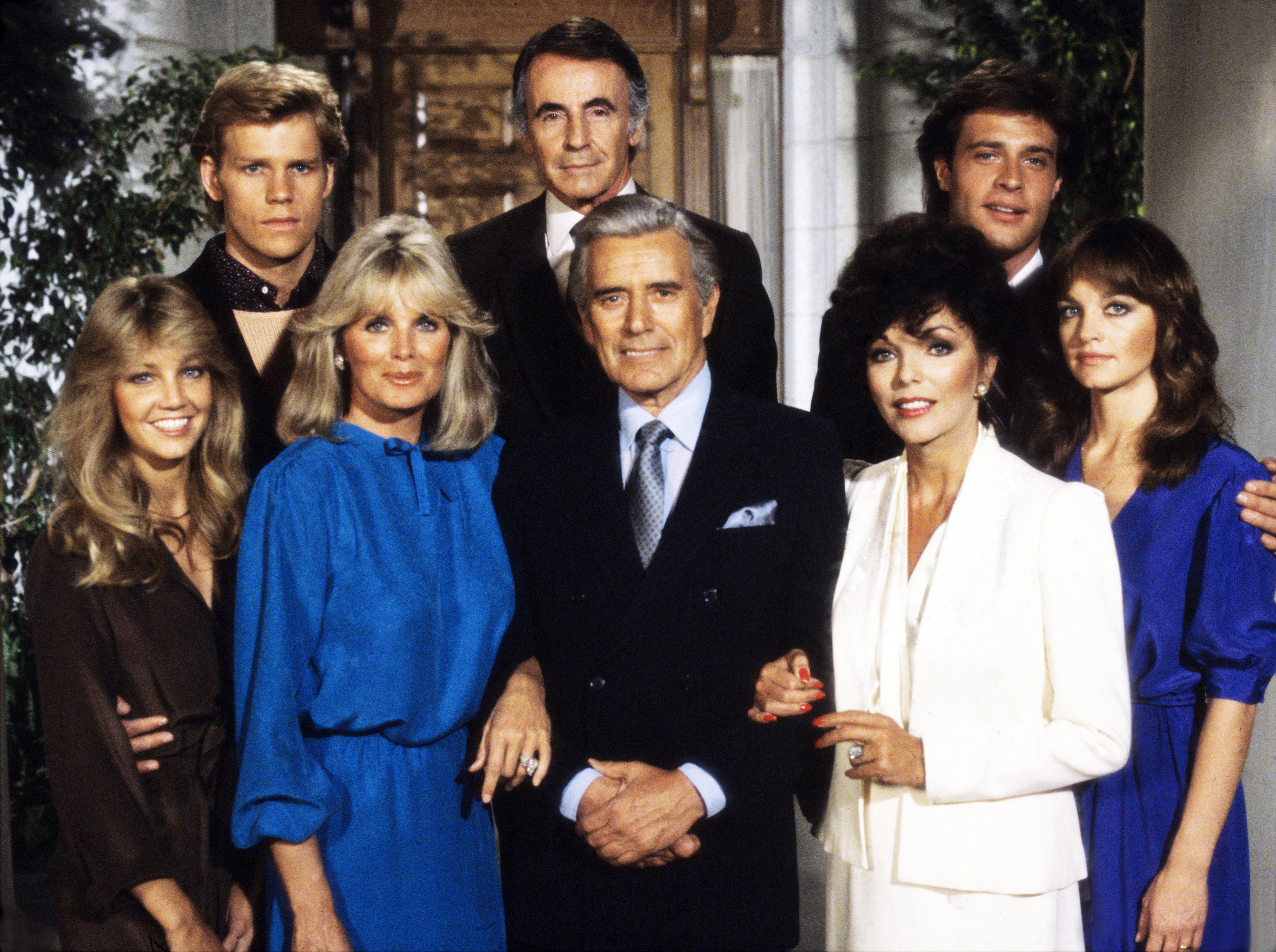 Portrait of 'Dynasty' Cast, back row, from left, actors Al Corley, as Steven, Lee Bergere, as Joseph, John James, as Jeff; front row, from left: Heather Locklear, as Sammy Jo, Linda Evans, as Krystle, John Forsythe, as Blake, Joan Collins, as Alexis, and Pamela Sue Martin, as Fallon, from the television show 'Dynasty,' Los Angeles, Calif. on April 20, 1981.