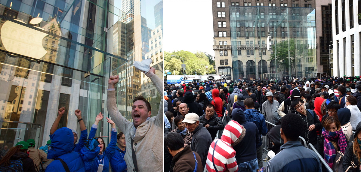 Andreas Gibson (l.) celebrates with employees outside the Fifth Avenue Apple store after being the first to exit with an iPhone 6 in hand during the first day of sales on Sept. 19, 2014. More than 4 million people pre-ordered the highly anticipated phone within the first 24 hours. As usual, both phones featured faster processors, upgraded cameras and multiple storage options.