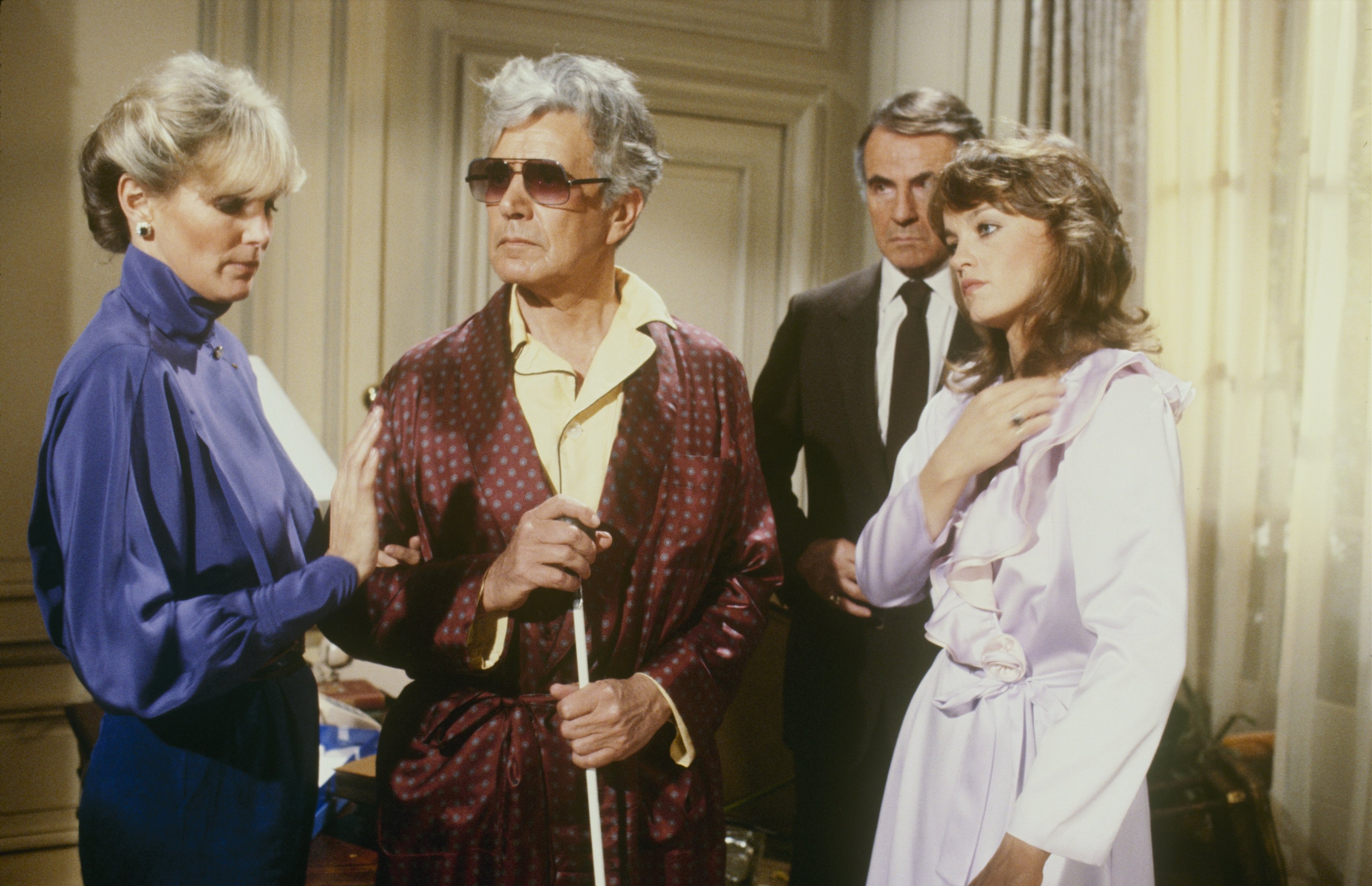 Blake (John Forsythe), Krystle (Linda Evans), Jospeh (Lee Bergere), and Fallon (Pamela Sue Martin) in the tv show 