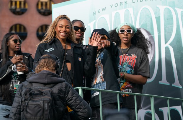 Fans and New York Liberty players celebrate during a ticker-tape parade in Manhattan's 'Canyon of Heroes' the following the Liberty's WNBA Championship win on Thursday, Oct. 22, 2024, in New York City. (Barry Williams for New York Daily News)