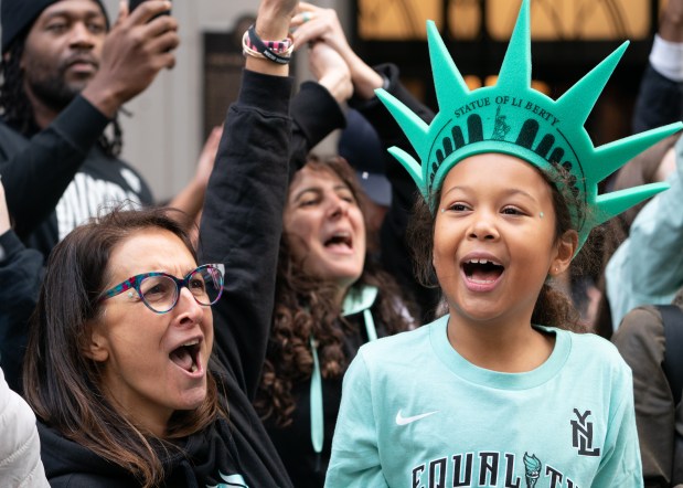 Fans and New York Liberty players celebrate during a ticker-tape parade in Manhattan's 'Canyon of Heroes' the following the Liberty's WNBA Championship win on Thursday, Oct. 22, 2024, in New York City. (Barry Williams for New York Daily News)