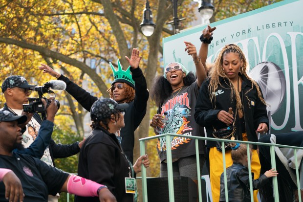 Fans and New York Liberty players celebrate during a ticker-tape parade in Manhattan's 'Canyon of Heroes' the following the Liberty's WNBA Championship win on Thursday, Oct. 22, 2024, in New York City. (Barry Williams for New York Daily News)