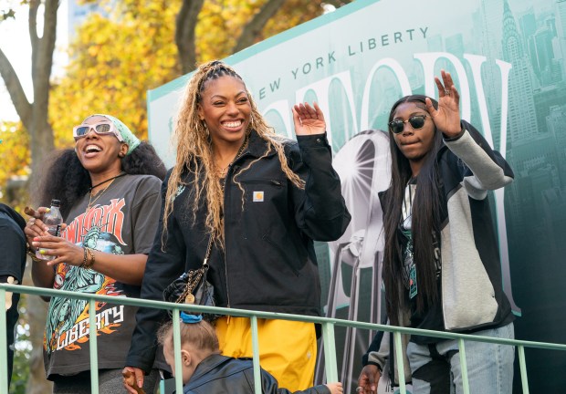Fans and New York Liberty players celebrate during a ticker-tape parade in Manhattan's 'Canyon of Heroes' the following the Liberty's WNBA Championship win on Thursday, Oct. 22, 2024, in New York City. (Barry Williams for New York Daily News)