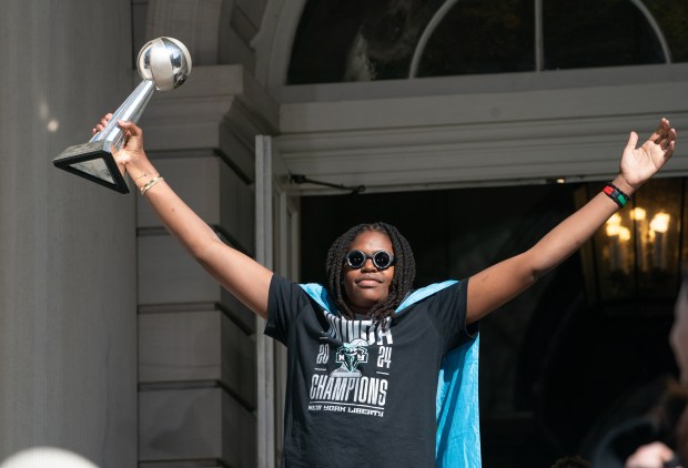 Fans and New York Liberty players celebrate during a ticker-tape parade in Manhattan's 'Canyon of Heroes' the following the Liberty's WNBA Championship win on Thursday, Oct. 22, 2024, in New York City. (Barry Williams for New York Daily News)