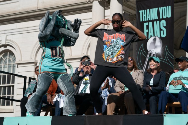 Fans and New York Liberty players celebrate during a ticker-tape parade in Manhattan's 'Canyon of Heroes' the following the Liberty's WNBA Championship win on Thursday, Oct. 22, 2024, in New York City. (Barry Williams for New York Daily News)