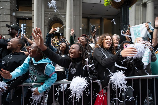 Fans and New York Liberty players celebrate during a ticker-tape parade in Manhattan's 'Canyon of Heroes' the following the Liberty's WNBA Championship win on Thursday, Oct. 22, 2024, in New York City. (Barry Williams for New York Daily News)