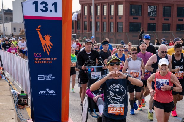 Views of the New York City TCS Marathon as participants make their way across the Pulaski Bridge in Brooklyn on Sunday November 5, 2023. 1129. (Theodore Parisienne for New York Daily News)