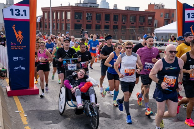 Views of the New York City TCS Marathon as participants make their way across the Pulaski Bridge in Brooklyn on Sunday November 5, 2023. 1129. (Theodore Parisienne for New York Daily News)