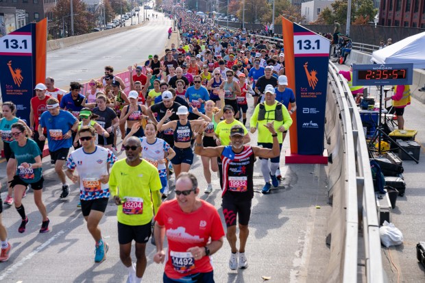 Views of the New York City TCS Marathon as participants make their way across the Pulaski Bridge in Brooklyn on Sunday November 5, 2023. 1129. (Theodore Parisienne for New York Daily News)