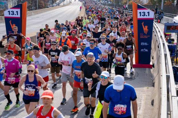 Views of the New York City TCS Marathon as participants make their way across the Pulaski Bridge in Brooklyn on Sunday November 5, 2023. 1129. (Theodore Parisienne for New York Daily News)